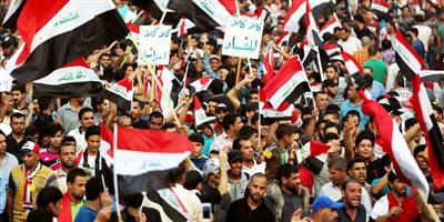 داعش تعدم 5 عراقيين.. والآلاف يتظاهرون مطالبين بالإصلاح 